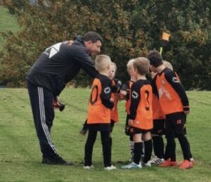 3 New Years Resolutions grassroots football coaches, players and parents should make